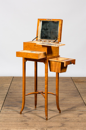 A fruitwood and burl wood veneered vanity set on foot, 20th C.