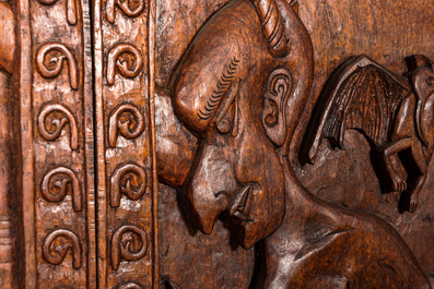 A pair of imposing wooden throne seats with relief design, 20th C.