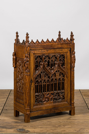 An attractive reticulated gothic wooden panel mounted in a Gothic Revival cabinet, 16th and 19th C.
