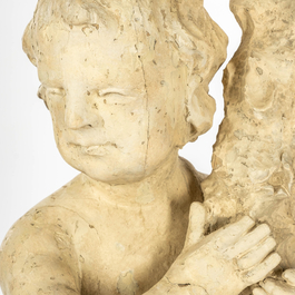 A pair of white patinated wooden putti holding a cornucopia, 18th C.