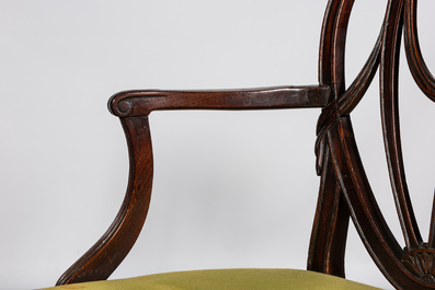 Five English 'Prince of Wales feathers' dining chairs in the style of George Hepplewhite, 19th C.