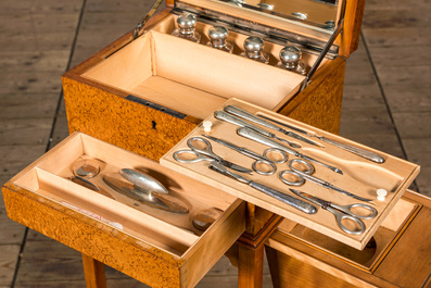 A fruitwood and burl wood veneered vanity set on foot, 20th C.