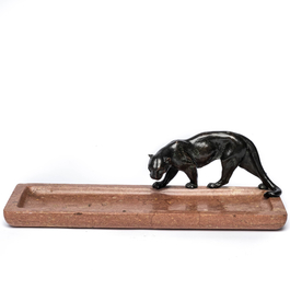 A marble pencil case with a patinated bronze panther, 20th C.