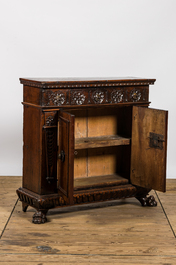 An Italian walnut two-door cabinet, 18th C.