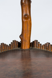 A naturalistic wooden corner rack with three shelves, 19/20th C.
