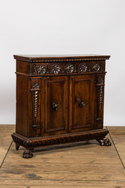 An Italian walnut two-door cabinet, 18th C.