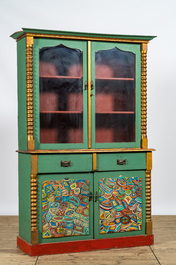 A gilt and polychrome wooden display cabinet, 20th C.