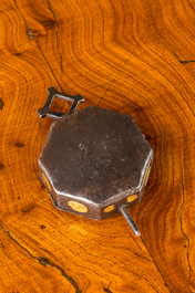 An octagonal engraved and partly gilt reliquary box, 17th C.