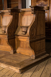 A pair of impressive Flemish oak pews, 18th C.