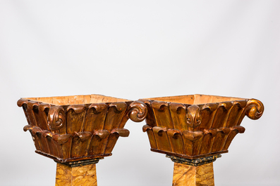 A pair of gilt and lacquered wooden Corinthian capitals, 19th C.