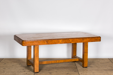 An Art Deco-style burl wood veneered table, 20th C.