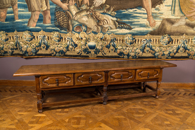 A walnut console table with four drawers, 19th C. with older elements