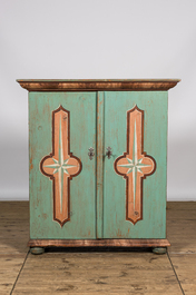 A polychrome wooden two-door cabinet with inside landscape design, 19th C.