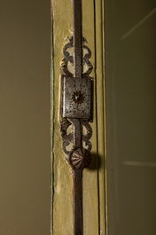 A large polychromed oak display cabinet, 18th C.