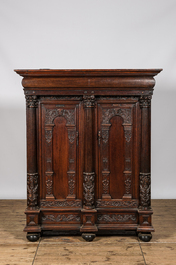 A Dutch oak two-door 'keeftkast' cupboard, 17th C. with later elements