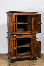 A walnut two-door cabinet with ebonised accents, 17th C.