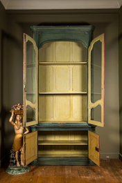 A large polychromed oak display cabinet, 18th C.