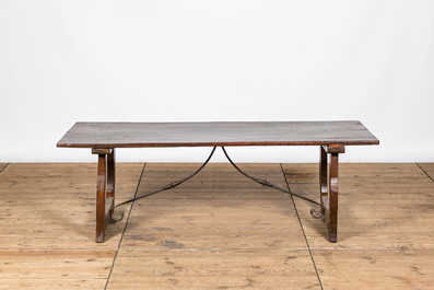 A Spanish wrought iron mounted wooden table, 19th C.