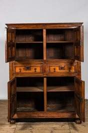 An English Jacobean-style four-door cabinet, 19th C.