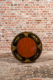 A black lacquered and gilt chinoiserie side table, 20th C.
