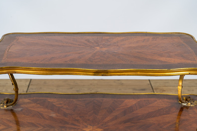 A French gilt bronze mounted mahogany &eacute;tag&egrave;re or serving table, 19/20th C.