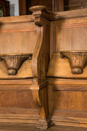 A pair of impressive Flemish oak pews, 18th C.