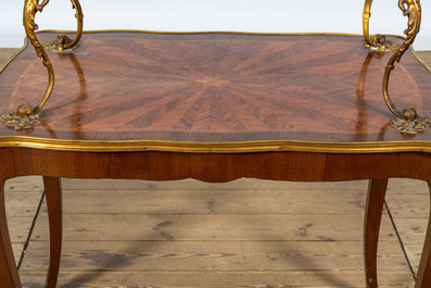 A French gilt bronze mounted mahogany &eacute;tag&egrave;re or serving table, 19/20th C.