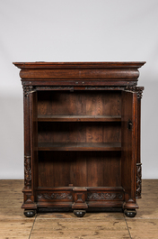 A Dutch oak two-door 'keeftkast' cupboard, 17th C. with later elements