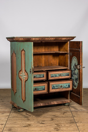 A polychrome wooden two-door cabinet with inside landscape design, 19th C.