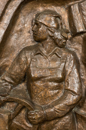 An impressive large communist subject bronze relief of a factory worker, possibly Eastern Europe, 3rd quarter 20th C.