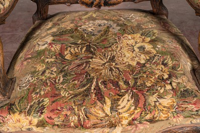 A Black Forest wooden armchair with acorns and oak leafs, 19th C.