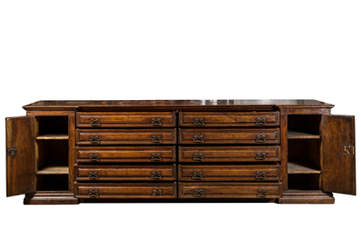 An imposing Italian walnut sacristy commode, 17th C.