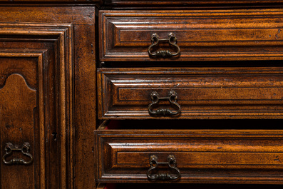 An imposing Italian walnut sacristy commode, 17th C.