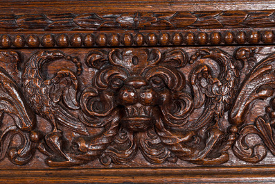 A Flemish richly carved oak 'beeldenkast' or cupboard, 17th C.