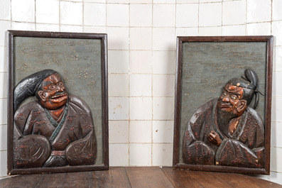 Three Japanese lacquered carved wooden panels, Meiji, 19th C.