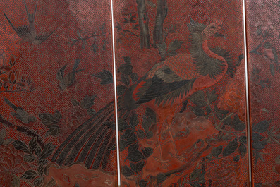 A Chinese red- and black-lacquered eightfold panel with a battle scene and a landscape with birds, 1st half 20th C.