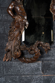 A mirror in a basswooden 'water faune' frame, 19th C.