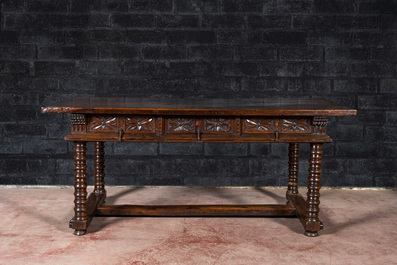 A Spanish walnut table with three drawers, 17th C