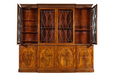 A large English magohany four-door break fronted library bookcase, 19th C.