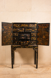 An English lacquered and painted chinoiserie cabinet on stand, 19th C.