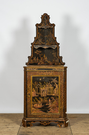 A black-lacquered and gilt chinoiserie corner cabinet, 20th C.