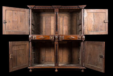 An imposing baroque-style parquetry oak four-door cupboard, 19th C.