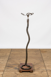A patinated bronze floor lamp in the shape of a snake, 1st half 20th C.