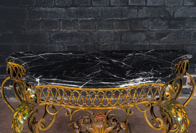 A Louis XV-style polychrome wrought iron console with black marble top, 19th C.