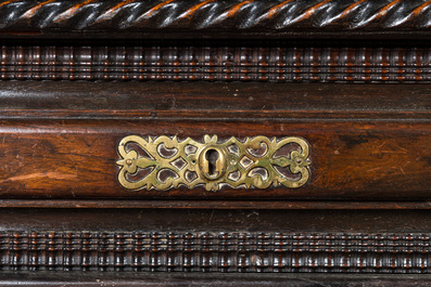 A partly ebonised walnut table on barley-twist base with baluster legs, 19th C.