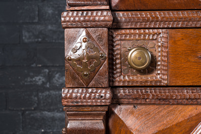 An imposing baroque-style parquetry oak four-door cupboard, 19th C.