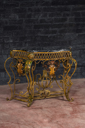 A Louis XV-style polychrome wrought iron console with black marble top, 19th C.