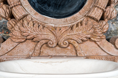 A marble washbasin with matching mirror in a historicising style, 20th C.
