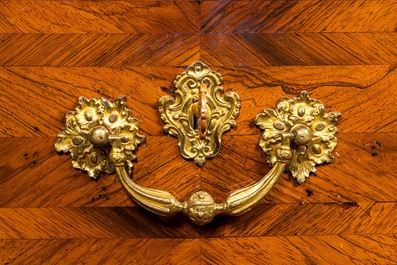 A French mahogany veneered gilt bronze mounted chest of drawers with marble top, 18th C.