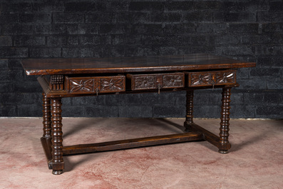 A Spanish walnut table with three drawers, 17th C